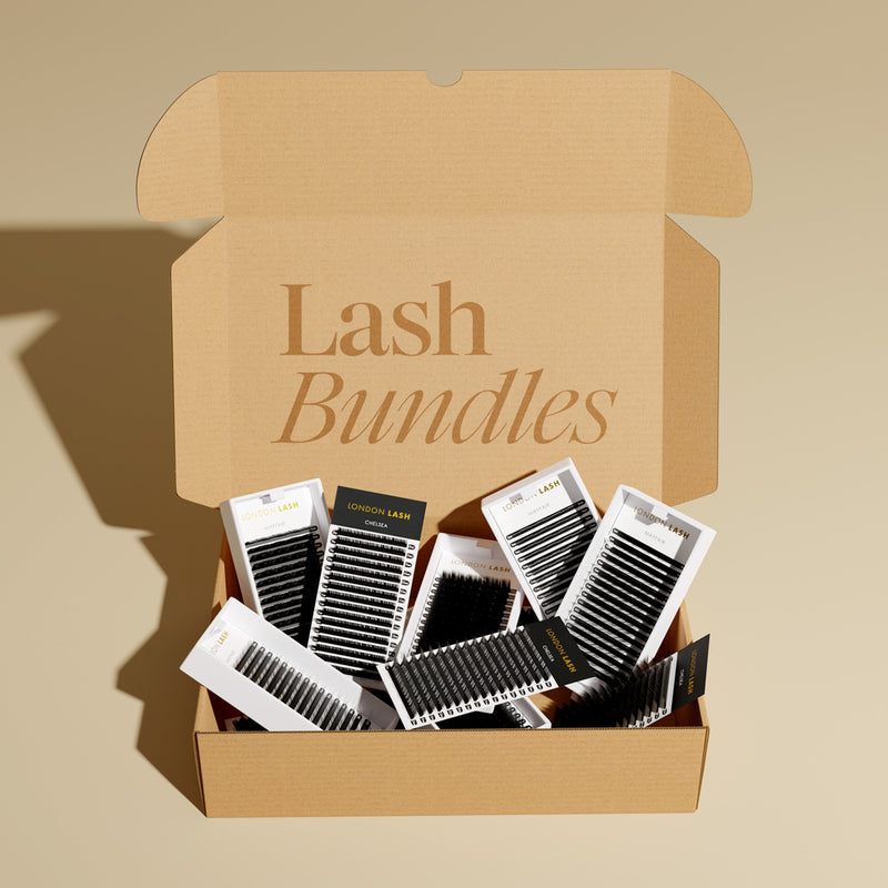 large carton box filled with many lash extension trays