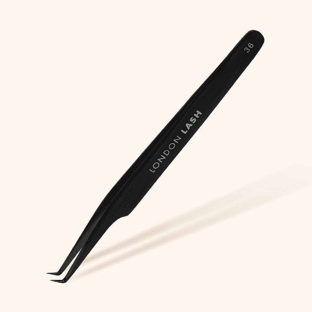 Ultra Fine Tip Mega Volume Tweezers in black and gold