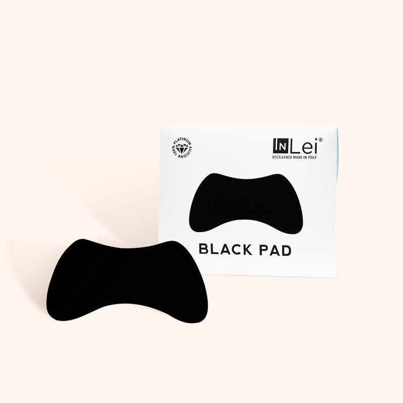 InLei Silicone Pads box and black pads outside the box 